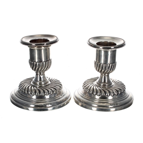 591 - Pair of Victorian squat silver candlesticks, maker Mappin & Webb (John Newton Mappin), with bead... 