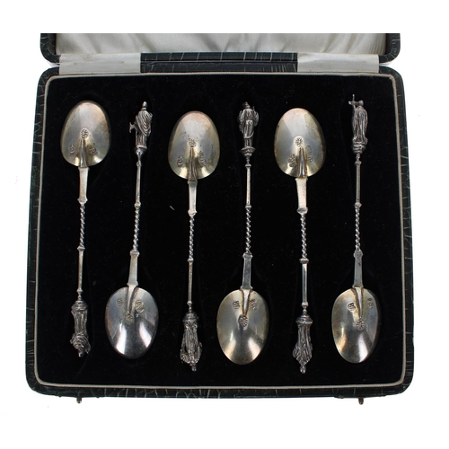 596 - Cased set of six Dutch silver Apostle finial spoons, each bearing a tree of life marks, initials VB ... 