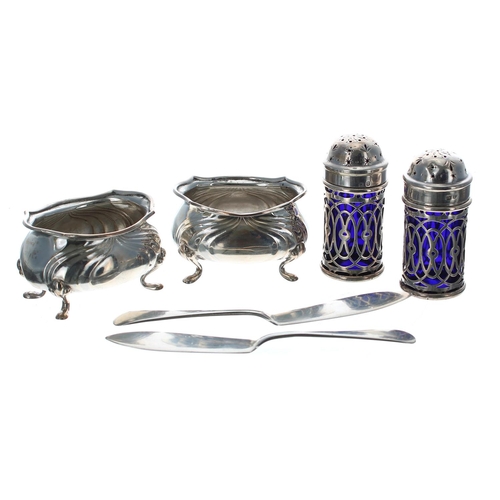 629 - Cased pair of Victorian silver cruets, with pierced cylinder covers enclosing blue glass liners, mak... 