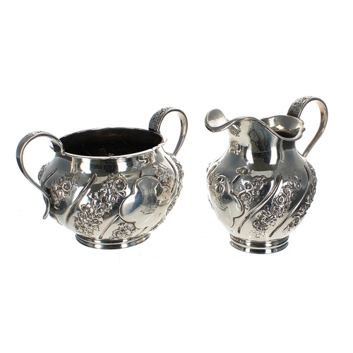 586 - Victorian silver bachelor three piece tea set, of melon form with wrythen foliate and floral embosse... 