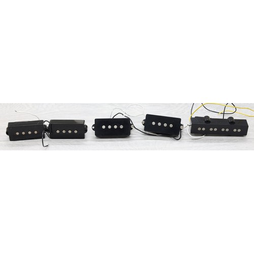 1841 - Two sets of Fender Precision Bass guitar pickups; together with a Jazz Bass pickup