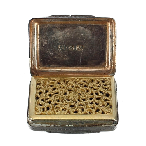 1227 - William IV silver vinaigrette of rectangular form with a fine gilded pierced interior, Birmingham 18... 