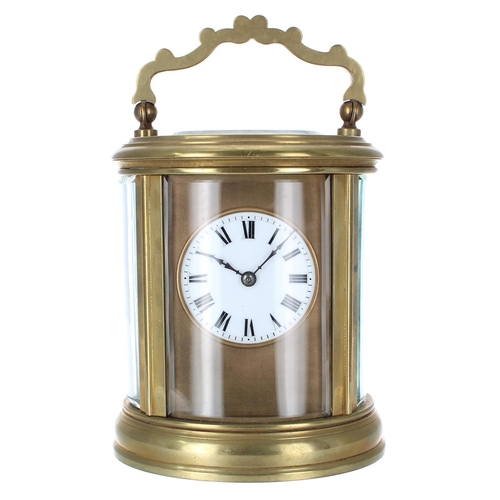 1061 - French oval carriage clock timepiece, the circular dial within a gilt mask and pillared stepped case... 