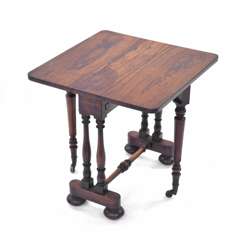 1406 - Unusual miniature Victorian rosewood Sutherland table, with baluster turned supports upon a stretche... 