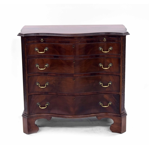 1424 - George III style mahogany serpentine chest of drawers, the moulded rim top over a pull-out slide and... 