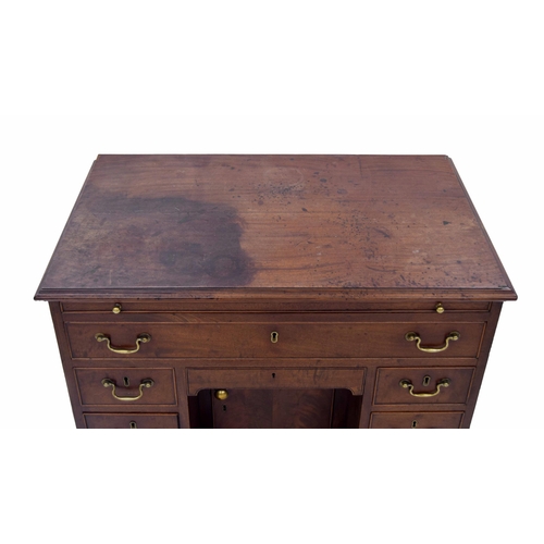 1426 - George III mahogany kneehole desk, the rectangular moulded top over a pull-out slide, single long dr... 