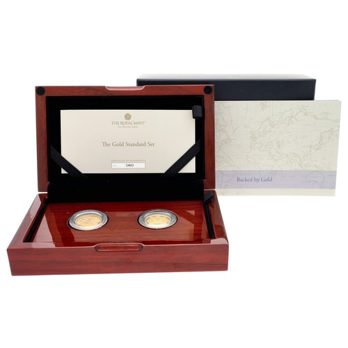 96 - The Royal Mint - The Gold Standard Set - to include a George V 1931 sovereign coin, 8gm; also  2021 ... 