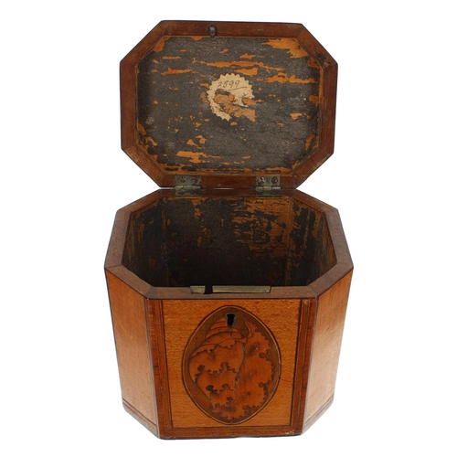 1265 - George III satinwood cross banded tea caddy, of rectangular form with canted corners, the hinged cov... 