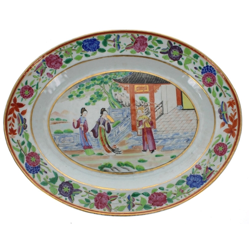 1311 - Pair of Chinese famille rose oval porcelain plates, each decorated with three lady's in a pagoda set... 