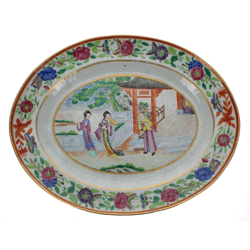 1311 - Pair of Chinese famille rose oval porcelain plates, each decorated with three lady's in a pagoda set... 