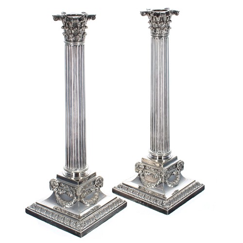 570 - Good pair of Elkington & Co. silver plated Corinthian column candelabra, constructing in multipl... 