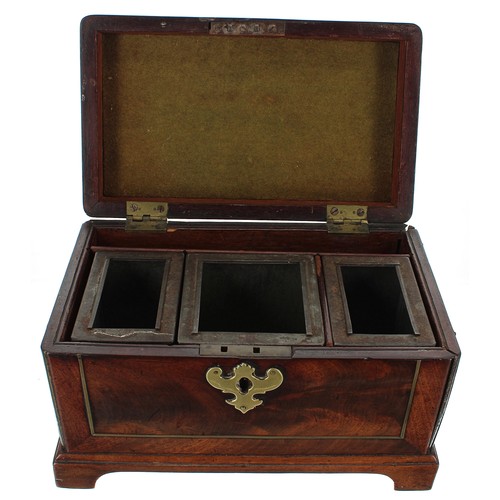 1251 - Georgian mahogany and brass banded rectangular tea caddy, the hinged cover with swing handle enclosi... 