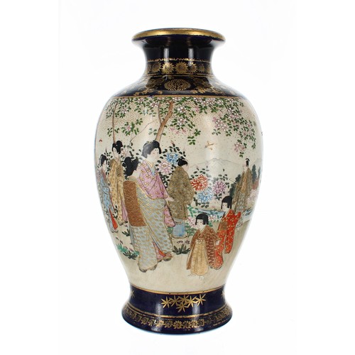 1307 - Japanese satsuma earthenware vase, decorated with panels of geishas in a foliate setting on a blue g... 