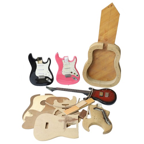 1854 - Selection of guitar making moulds/templates to include one for acoustic guitar ribs, acoustic tops, ... 