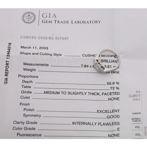 565 - Fine GIA Certified three stone diamond ring, the centre certified diamond modified cushion brilliant... 