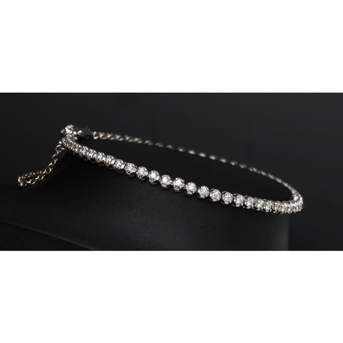 544 - 18ct white gold diamond set tennis line bracelet, round brilliant-cut, 1.00ct in total, width 3mm (r... 