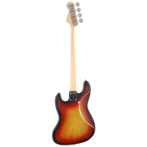 869 - 1972 Fender Jazz Bass guitar, made in USA; Body: three-tone sunburst finish, small buckle blemish to... 