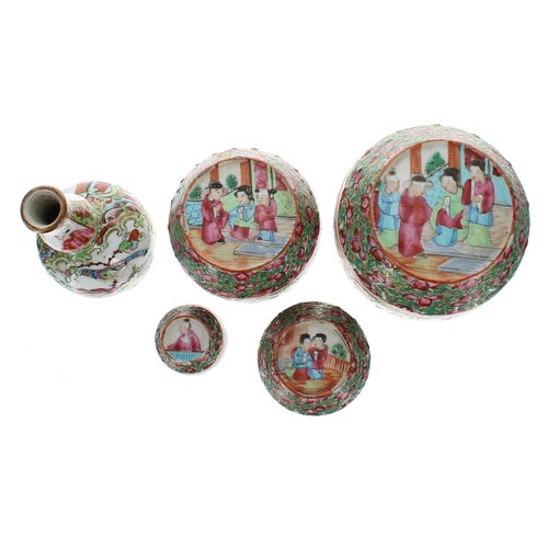 1316 - Graduated group of four 19th century Chinese Canton famille rose porcelain barrel pots with covers, ... 