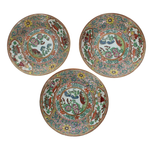 1324 - Pair of 19th century Chinese Canton famille rose porcelain teacups and saucers, decorated with figur... 