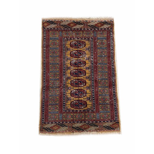 900 - Persian Baluch pattern rug, 68