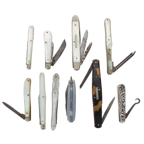 1209 - Group of nine mother of pearl and silver folding fruit knives; together with a group of further fold... 