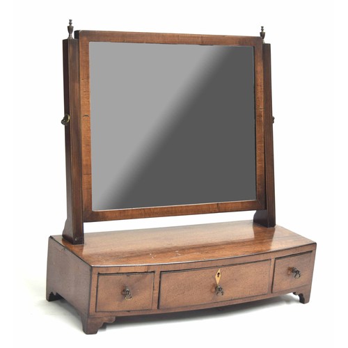 978 - 19th century mahogany swing loo/dressing mirror, the supports with brass finials over a bow-fronted ... 