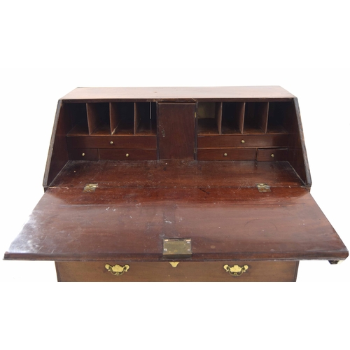 986 - Georgian mahogany bureau, the hinged fall-front enclosing a fitted interior with pigeon holes and sh... 