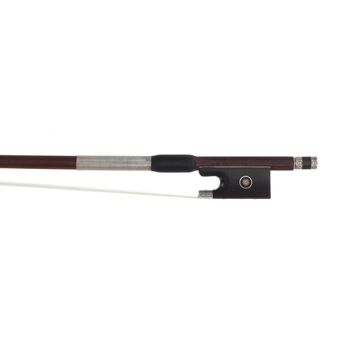 3221 - English silver mounted violin bow by and stamped J.S. Berridge, the stick round, the ebony frog with... 