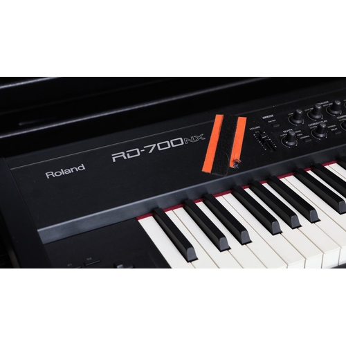 347 - Status Quo - stage used Roland RD-700NX digital stage piano, made in Japan, ser. no. Z1B8170, with e... 