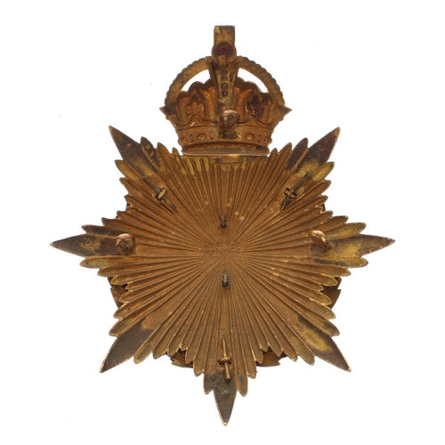 1163 - The Worcestershire Regiment helmet badge, the Brunswick Star plate around a laurel garland and strap... 