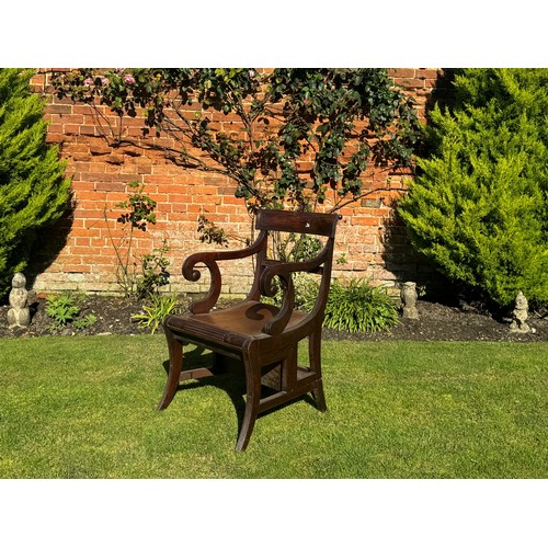 1431 - Rare Regency mahogany metamorphic library steps armchair, with a horizontal back over scroll swept a... 