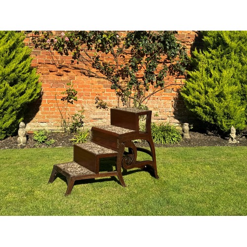 1431 - Rare Regency mahogany metamorphic library steps armchair, with a horizontal back over scroll swept a... 