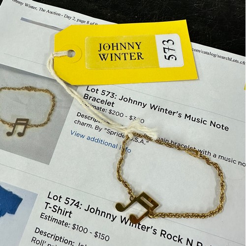 479 - Johnny Winter - personal gold coloured musical note chain bracelet by Spridel, USA*Formerly owned by... 