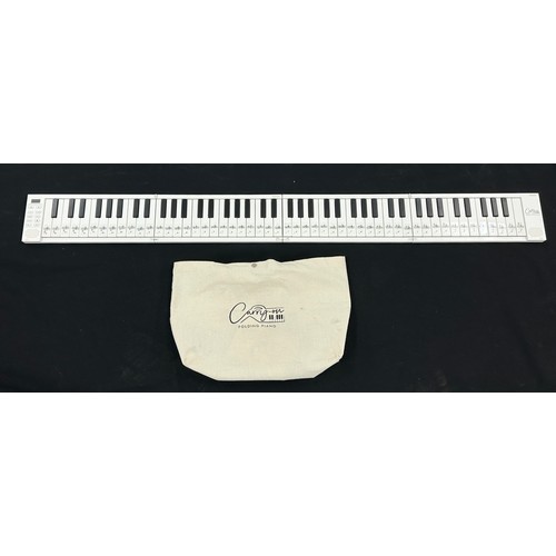 2005 - Carry On 88 touch key folding travel piano, with original bag*Please note: Gardiner Houlgate do not ... 