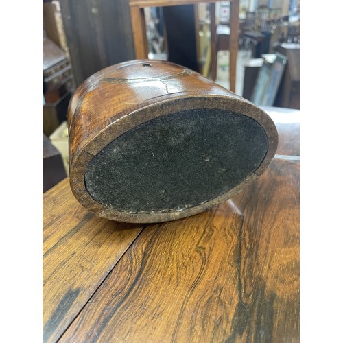 701 - Pretty Georgian oval tea caddy, with cross banded top with paterae over a swag decorated box, 5.5