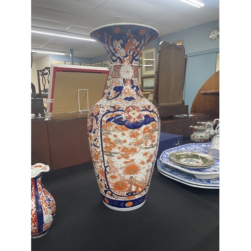 739 - Japanese Imari pattern baluster vase, decorated in a typical palette with birds in a garden panels o... 