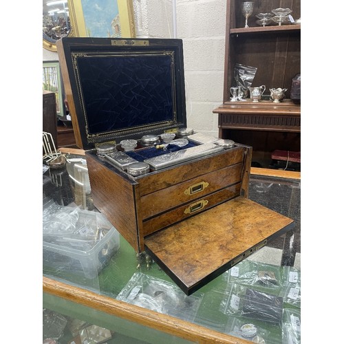 714 - Victorian walnut vanity travelling case, the hinged cover with brass presentation plaque enclosing a... 