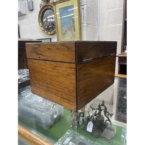 714 - Victorian walnut vanity travelling case, the hinged cover with brass presentation plaque enclosing a... 