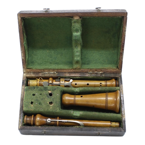 2808 - Fine boxwood oboe by and stamped Cahusac, London, with three silver plated keys on wooden saddles, o... 