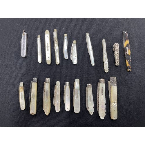 1209 - Group of nine mother of pearl and silver folding fruit knives; together with a group of further fold... 