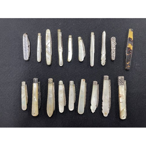 1209 - Group of nine mother of pearl and silver folding fruit knives; together with a group of further fold... 