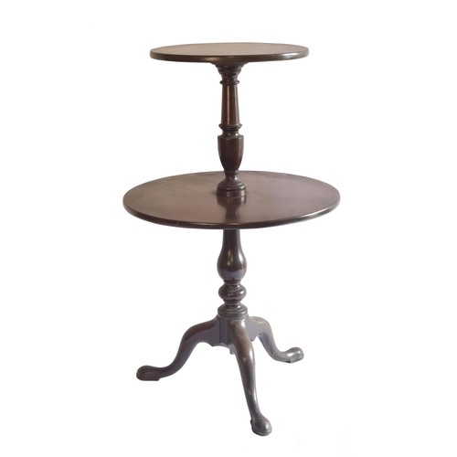 1357 - George III mahogany two tier circular dumb waiter, with baluster turned columns upon a tripod base t... 