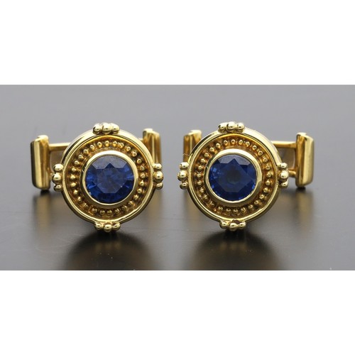 262 - Theo Fennell - Pair of 18ct yellow gold sapphire set cufflinks, circa 2000, signed, each set with a ... 