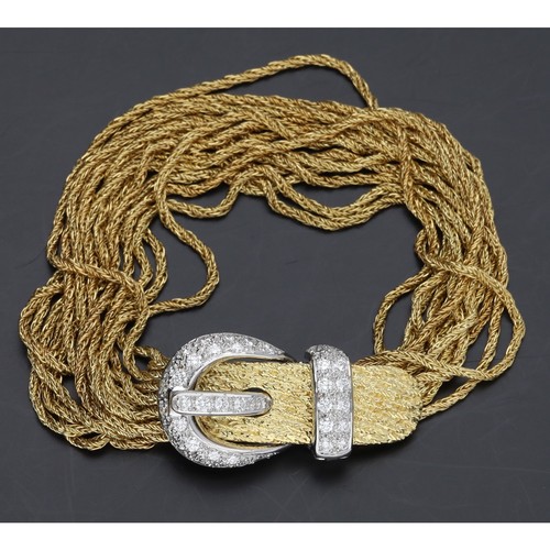 283 - Impressive 18ct bicolour multi-strand bracelet with a white metal diamond set buckle clasp, pavé set... 