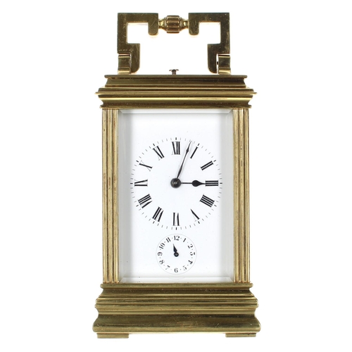 1205 - Repeater carriage clock with alarm and striking on a gong, within a pillared gorge style brass case,... 