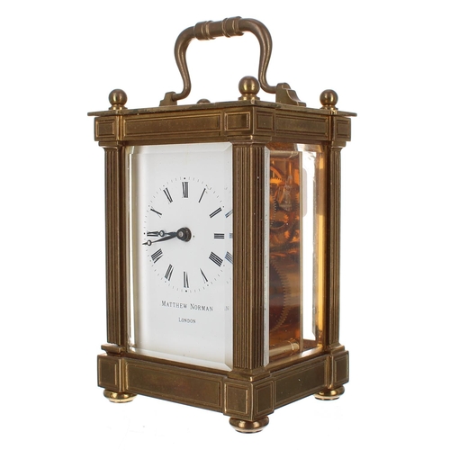 1214 - Matthew Norman of London carriage clock timepiece within a pillared brass case, 6.25