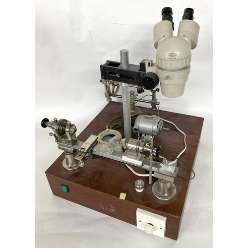 986 - Ime watchmakers lathe; together with an Olympus SZ microscope, mounted to a bespoke wooden base; als... 