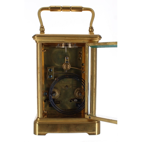 1229 - Henri Jacot carriage clock striking on a gong, bearing the maker's trademark stamp behind the dial p... 