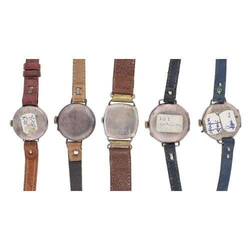 350 - Four silver ladies wire-lug wristwatches, with leather straps (one lacking glass); together with a s... 