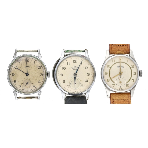 427 - Two Smiths De Luxe gentleman's wristwatches for repair; together with a Smiths gentleman's wristwatc... 